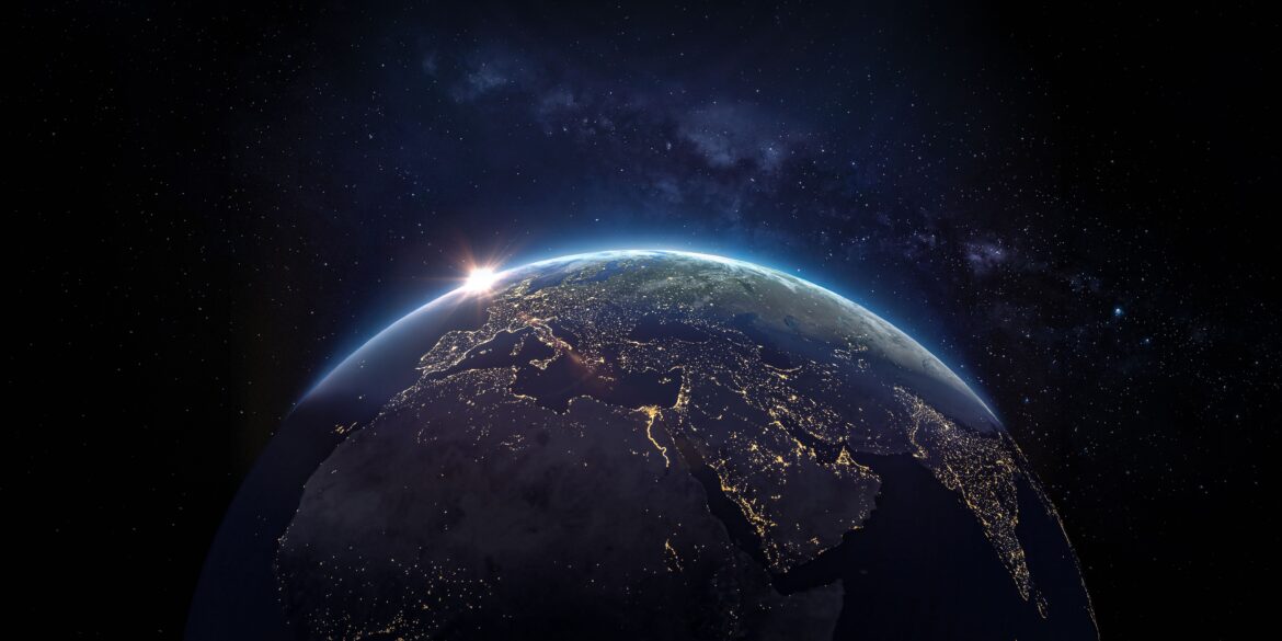 Globe showing illuminated continents to represent the highest-yielding stock markets and global dividend income opportunities in 2026.